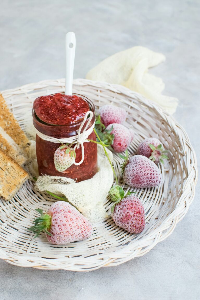 basket of strawberry fruits with jar of chia seed jam