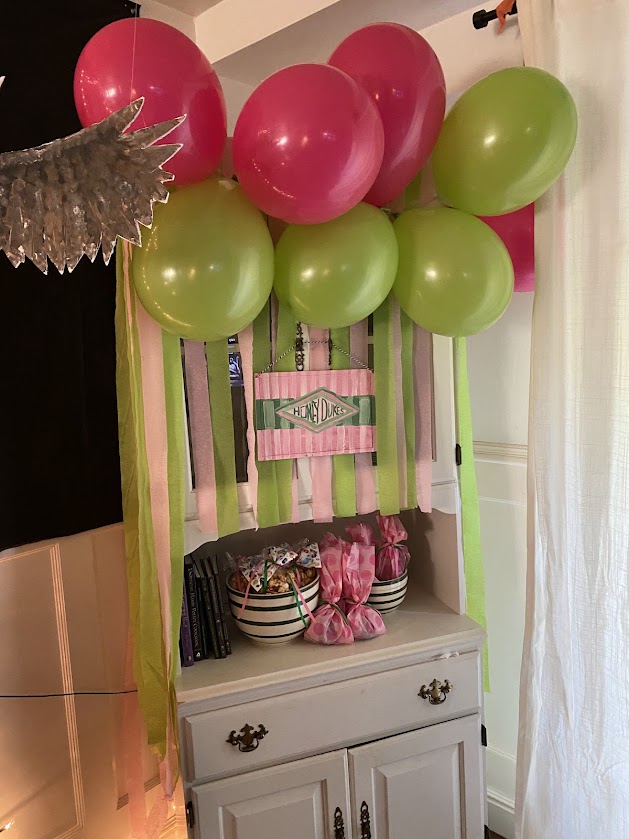 Honeydukes sweet shop with Bertie Bott’s Every Flavor Beans and caramel corn for a Harry Potter party candy room